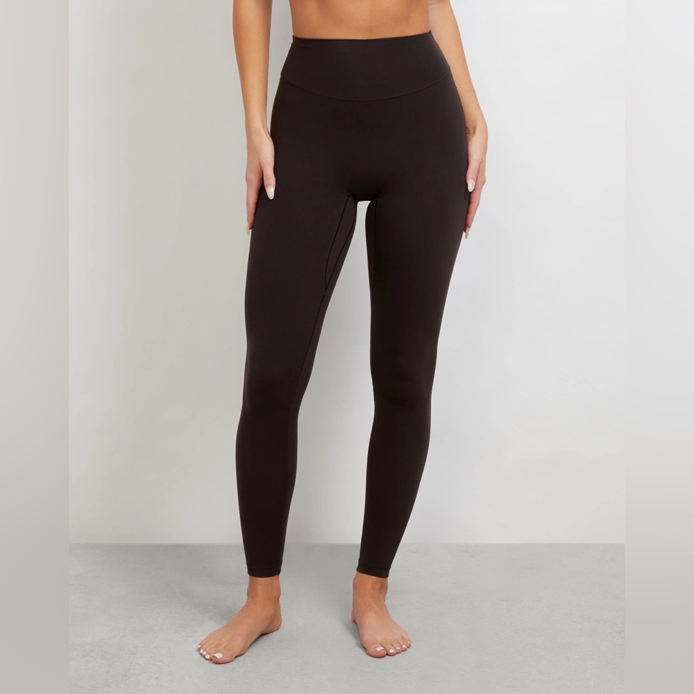 Stori iconic tight leggings in black size 4